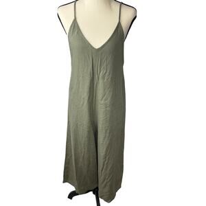 Olive Green linen jumpsuit with adjustable straps and side pockets